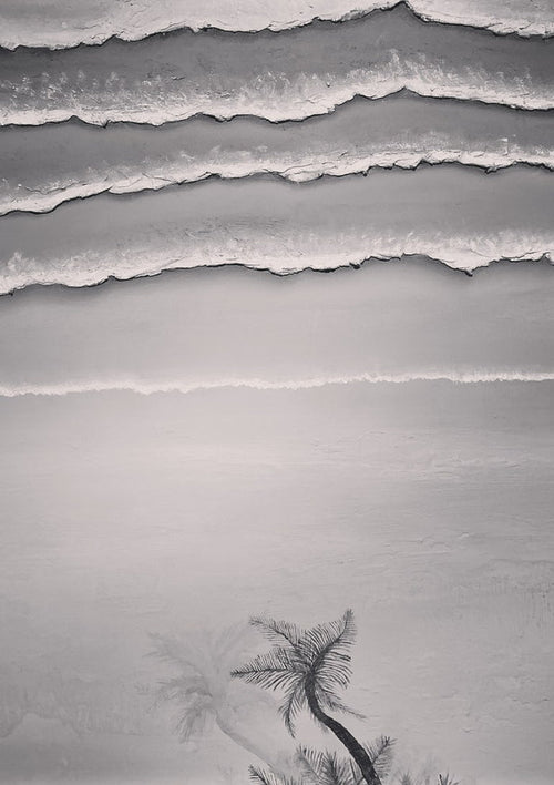 A breath before the shore by KG Studio - four lines of thick white surf and two palms held entirely in greys