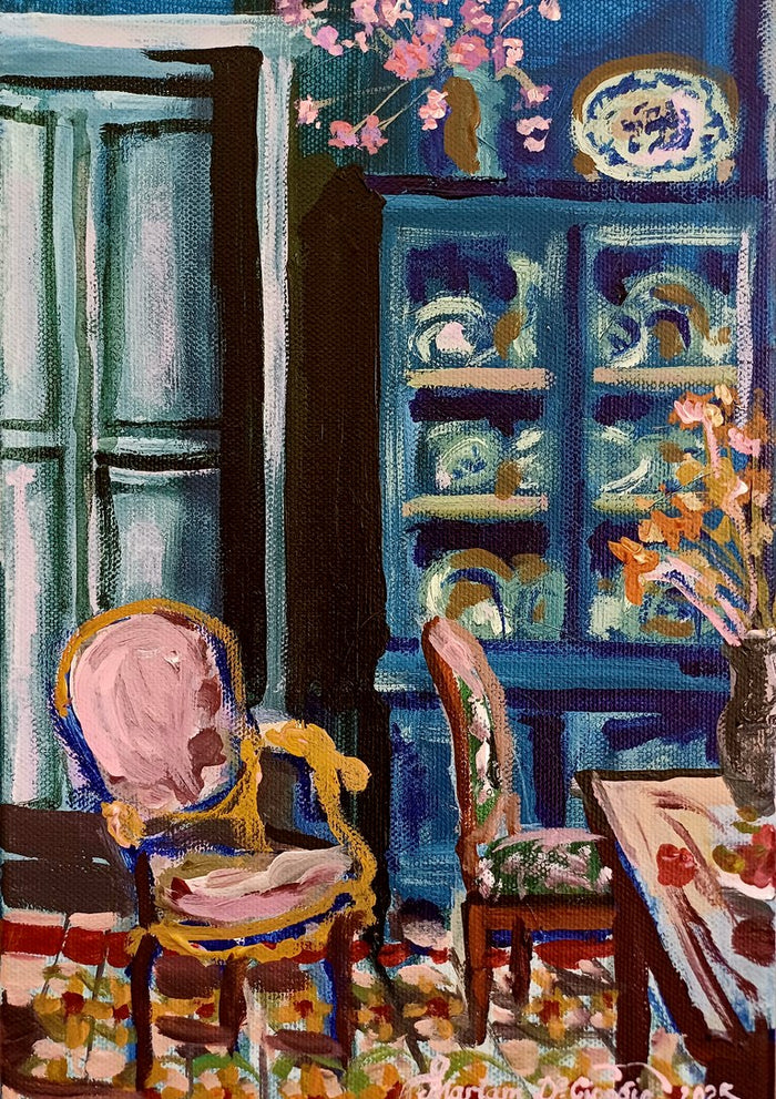 A moment of peace by Mariam De Giorgio — a blue china dresser, a gilded pink chair and vases of blossom in a shuttered room