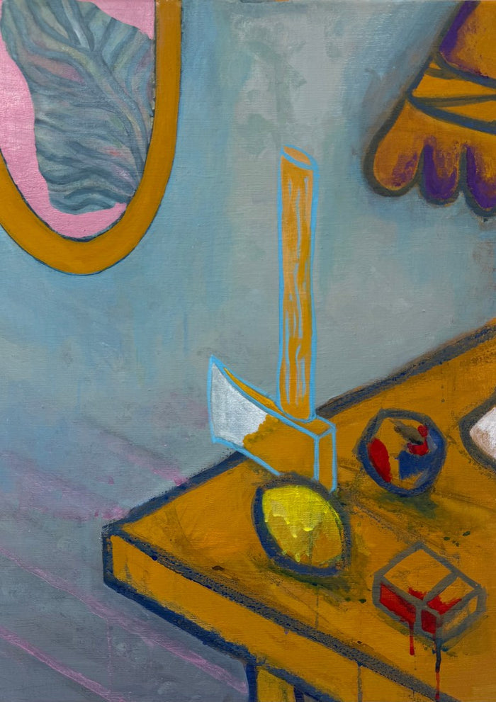 A set table by Samuel - axe, lemon and lamp on an ochre table against a pale blue wall