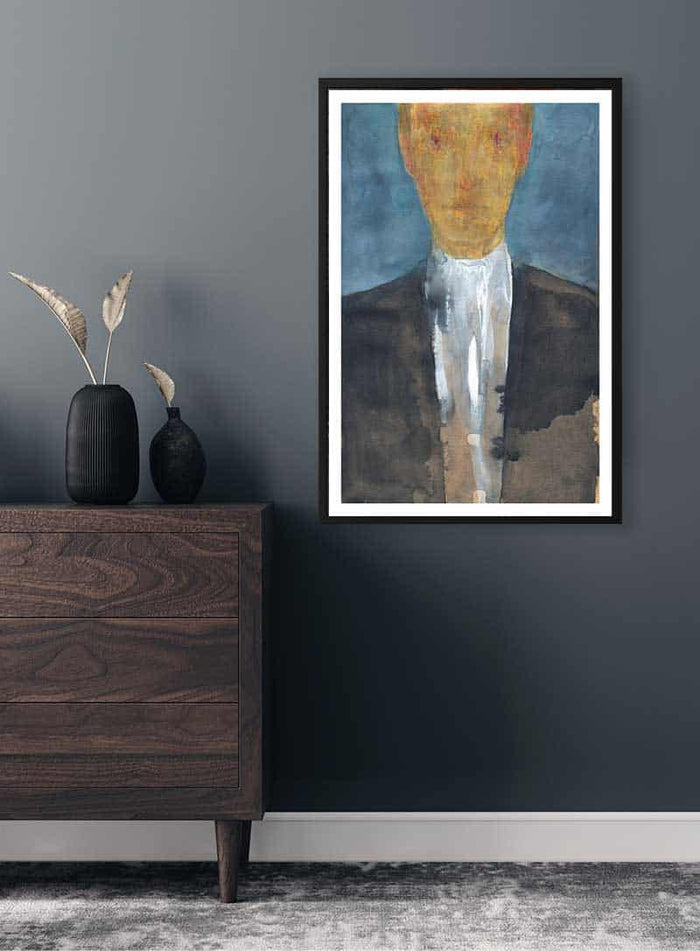 Framed Anonymous Man Plakat artwork on a dark wall above a wooden dresser with decorative vases.
