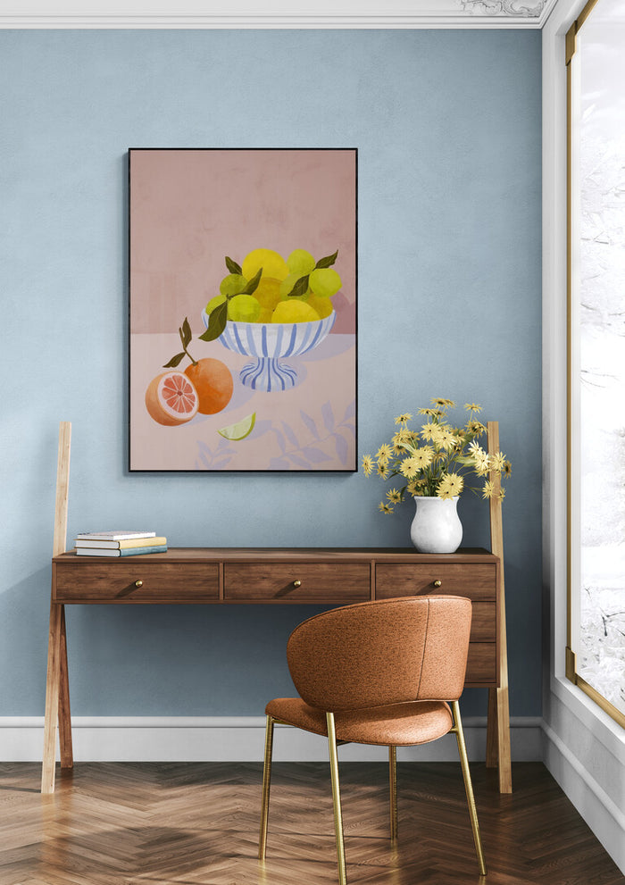 Bittersweet - Goed Blauw artwork hanging above a wooden desk with flowers, chair, and blue wall backdrop.
