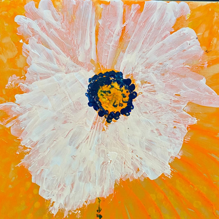 Bright by Maria-Tia - a white flower with a yellow and navy centre across a bright orange ground
