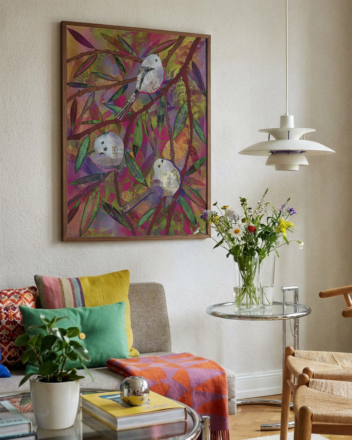 Cheerful Feathers by Enikő Marosváry-Kramcsák framed in a bright living room