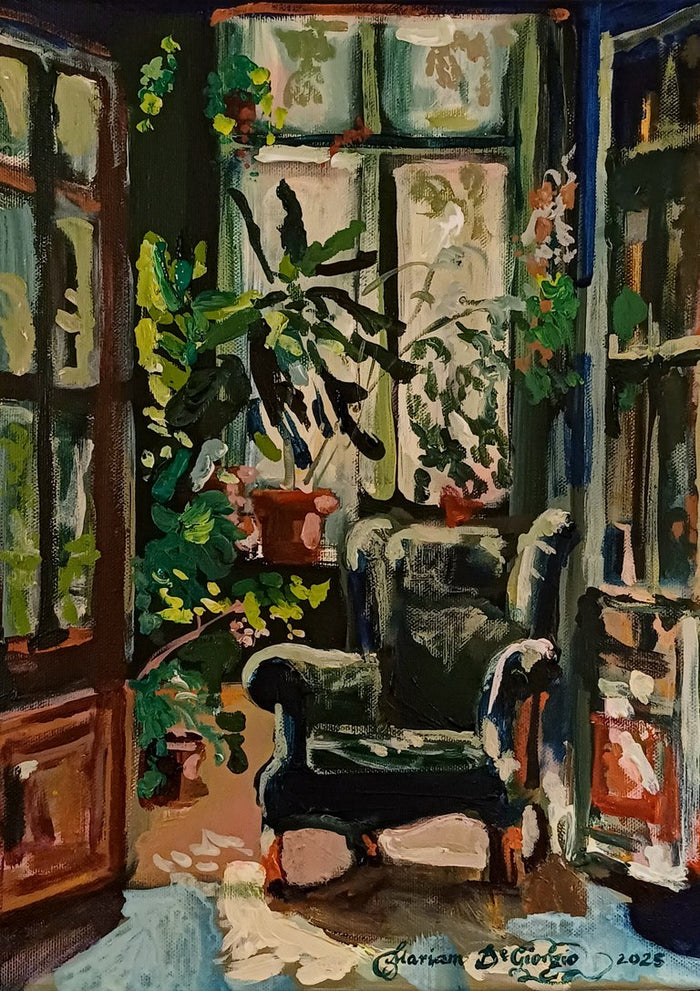 Conservatoire by Mariam De Giorgio - green armchair among potted plants in a sunlit conservatory
