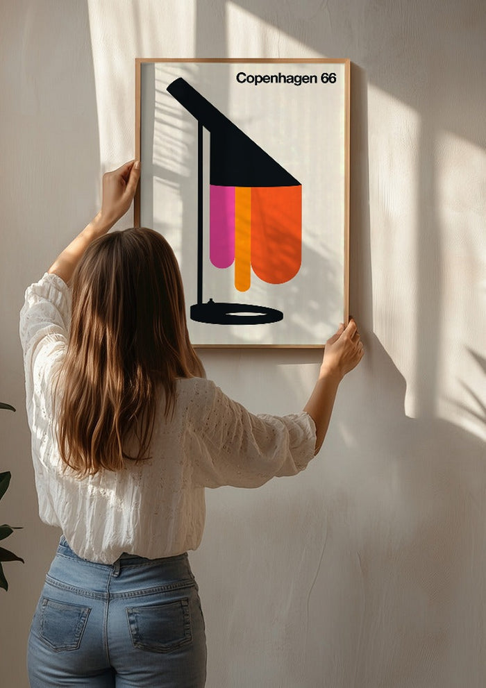 Copenhagen 66 by Bo Lundberg being hung on a sunlit wall