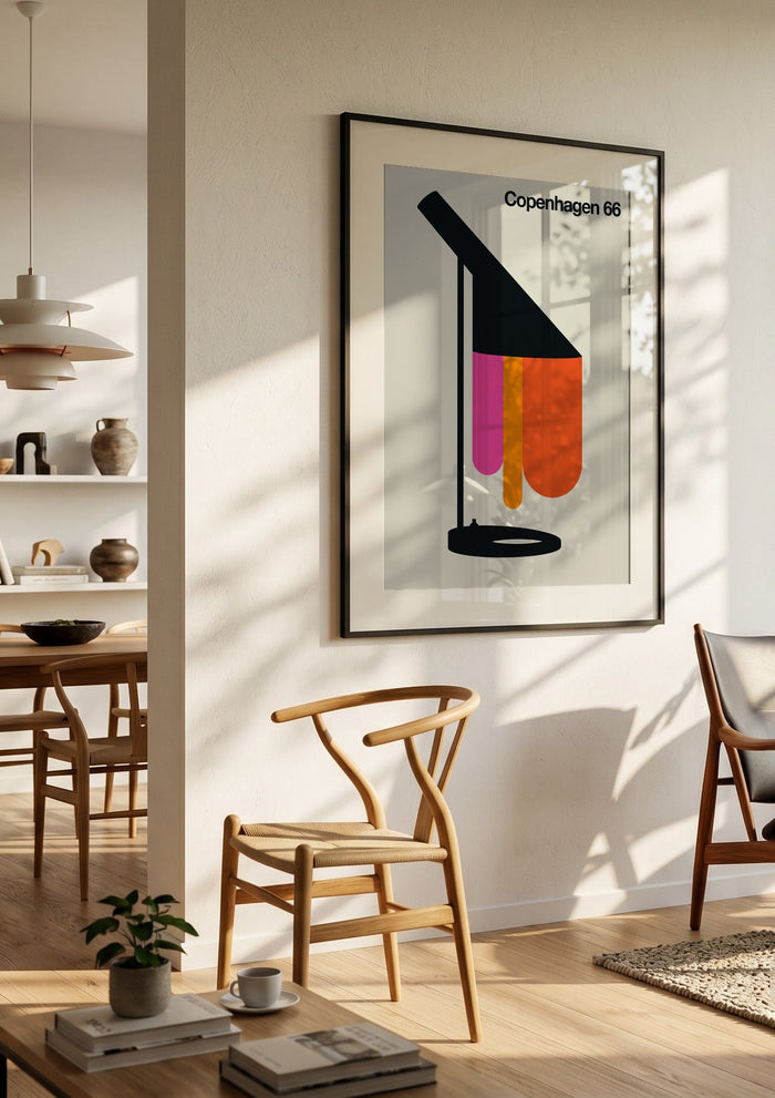 Copenhagen 66 by Bo Lundberg in a black frame in a bright dining room with wooden chairs