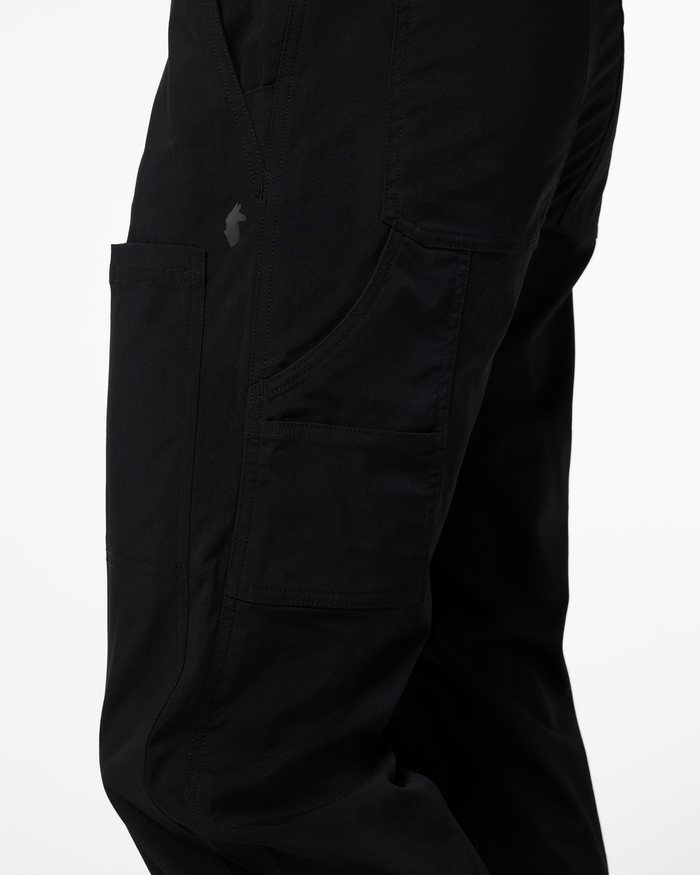 Coraje Tech Utility Pant - Men's, Black, Model Kellan