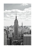 Black and white poster of the Empire State Building towering over the New York City skyline.