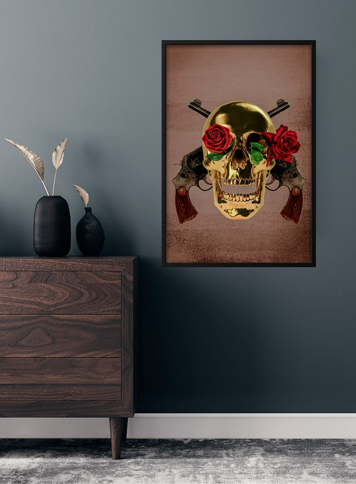 Guns n Roses poster featuring a gold skull with red roses and pistols, displayed on a modern wall.