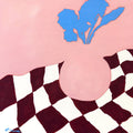 Iris by Elva Garma - blue iris in a pink vase on a maroon and white checked cloth