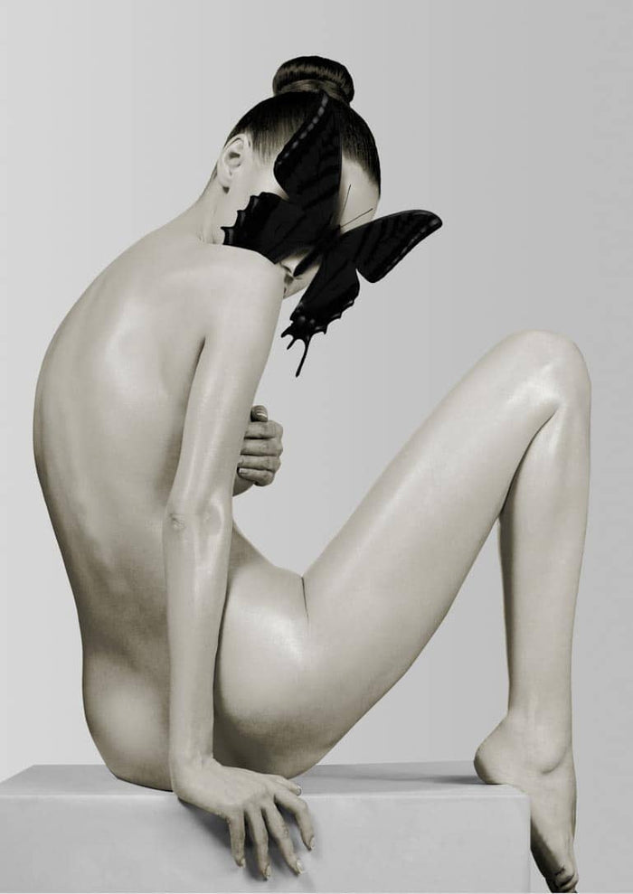 Artistic poster of a nude woman sitting, face partly covered by a large black butterfly on her shoulder.