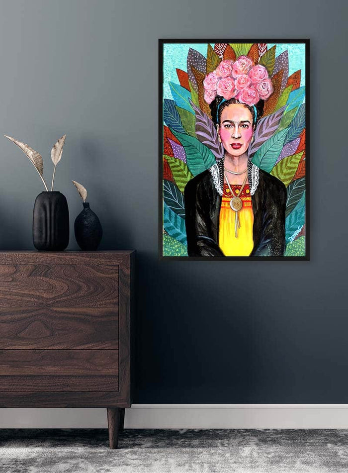 Framed Libertad artwork by Sylvie Demers featuring a colorful portrait, displayed on a modern dark wall.