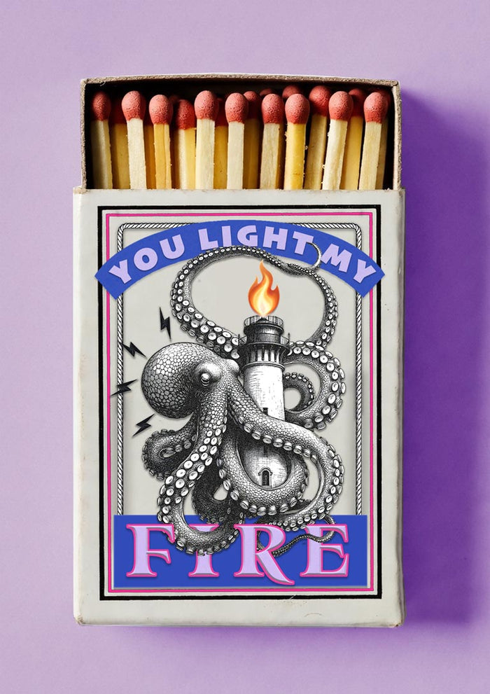Light My Fire by Daniel Leo — vintage matchbox poster with an engraved octopus wrapped around a flaming lighthouse