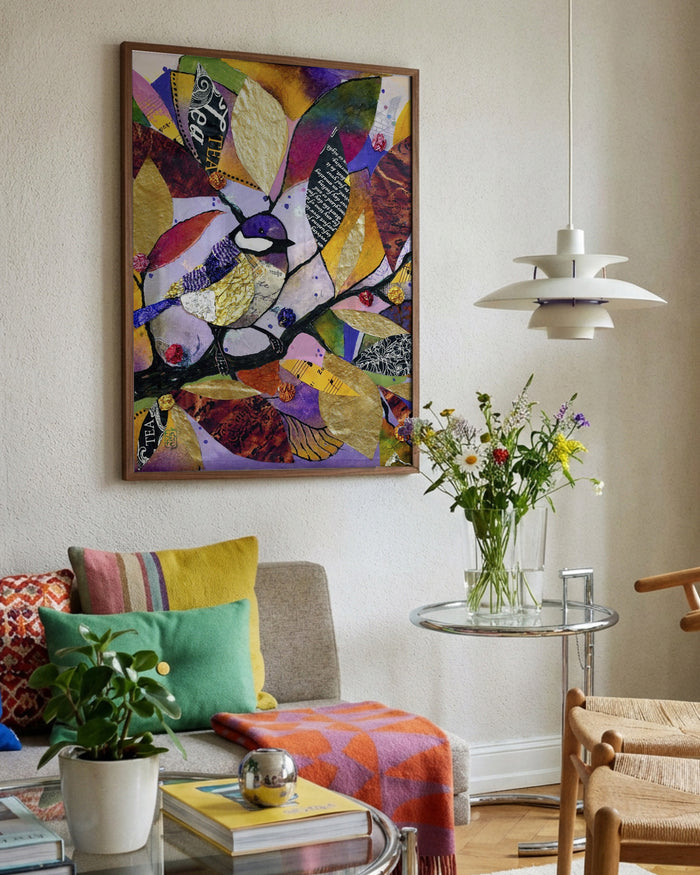 Little Tit in November by Enikő Marosváry-Kramcsák framed in a bright living room