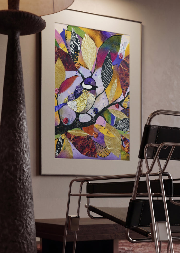 Little Tit in November by Enikő Marosváry-Kramcsák in a mounted frame in a modern interior