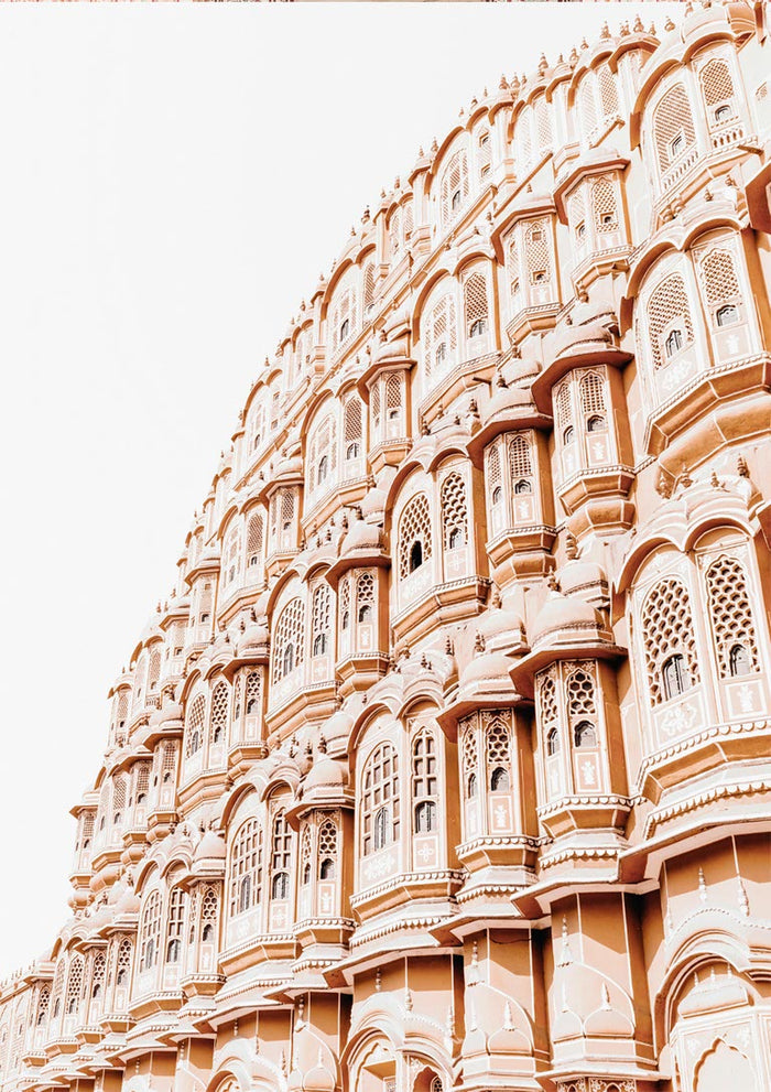 Old Indian palace facade with ornate windows and arches in warm, earthy tones. Wall art plakat design.