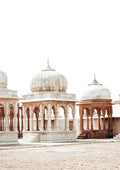 Poster of ancient marketplace with ornate stone pavilions and domes under a bright, clear sky.