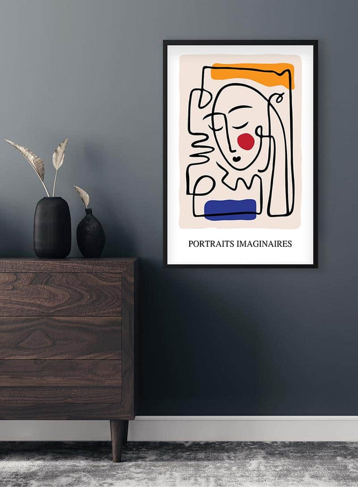 Picasso inspired abstract line art portrait poster with colorful accents, framed and hung on a modern wall.