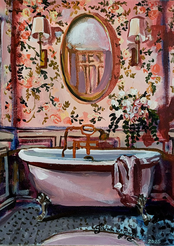 Pink chinoiserie bathroom by Mariam De Giorgio - pink claw-foot bathtub against rose wallpaper and an oval mirror