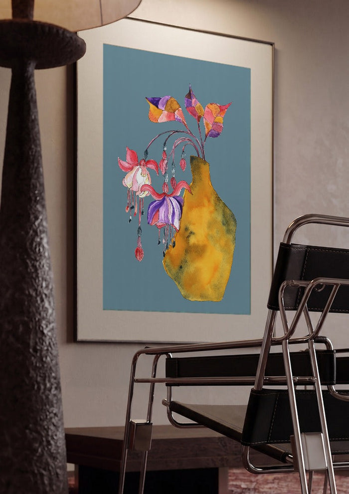 Princess earring by Marjorie Salvagni framed in a dim room beside a tubular steel chair