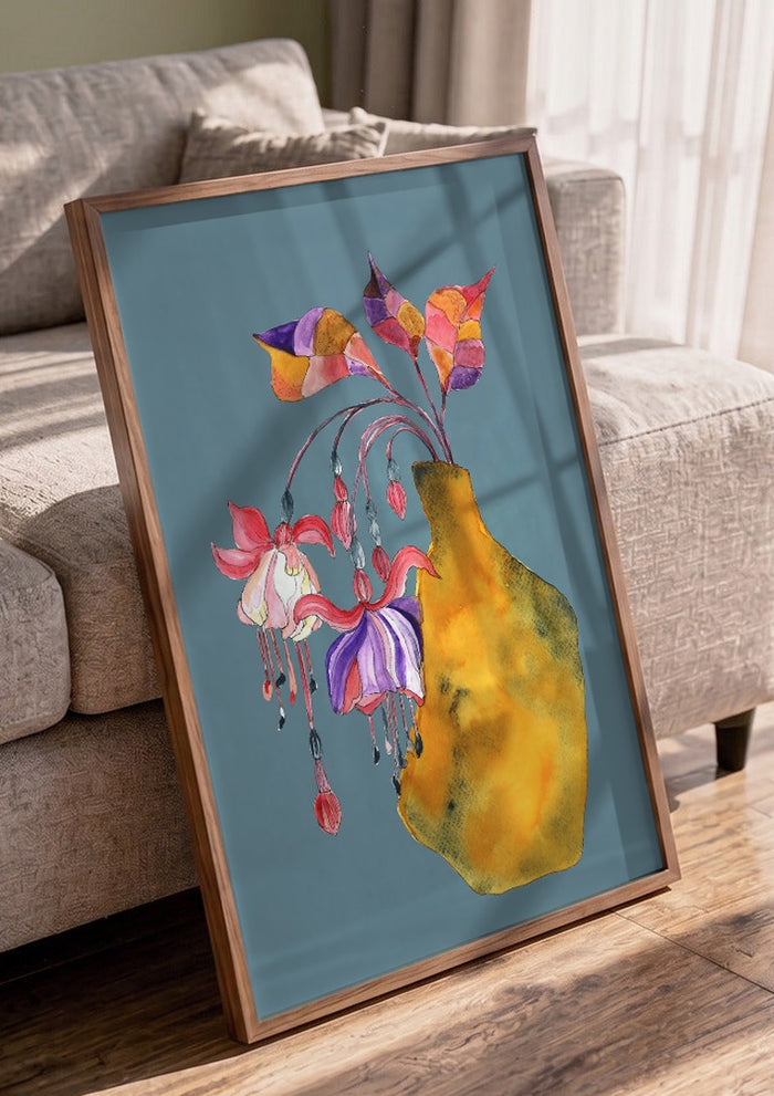 Princess earring by Marjorie Salvagni in a walnut frame leaning against a grey sofa