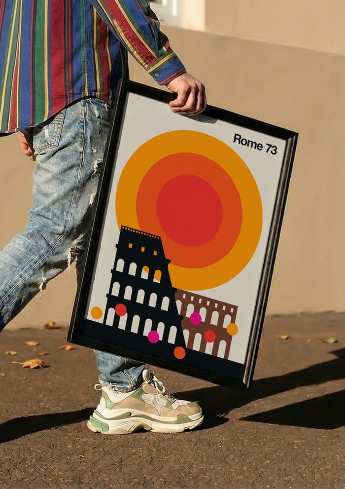 Rome 73 by Bo Lundberg carried in a black frame along a sunny street