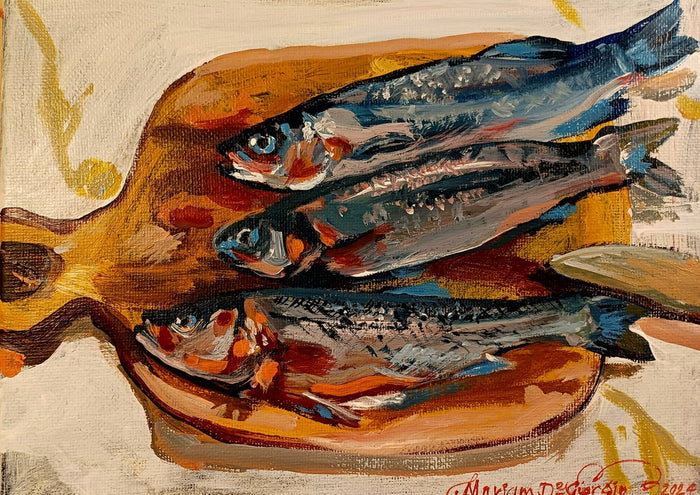 Seabream for lunch by Mariam De Giorgio - three sea bream on a wooden chopping board