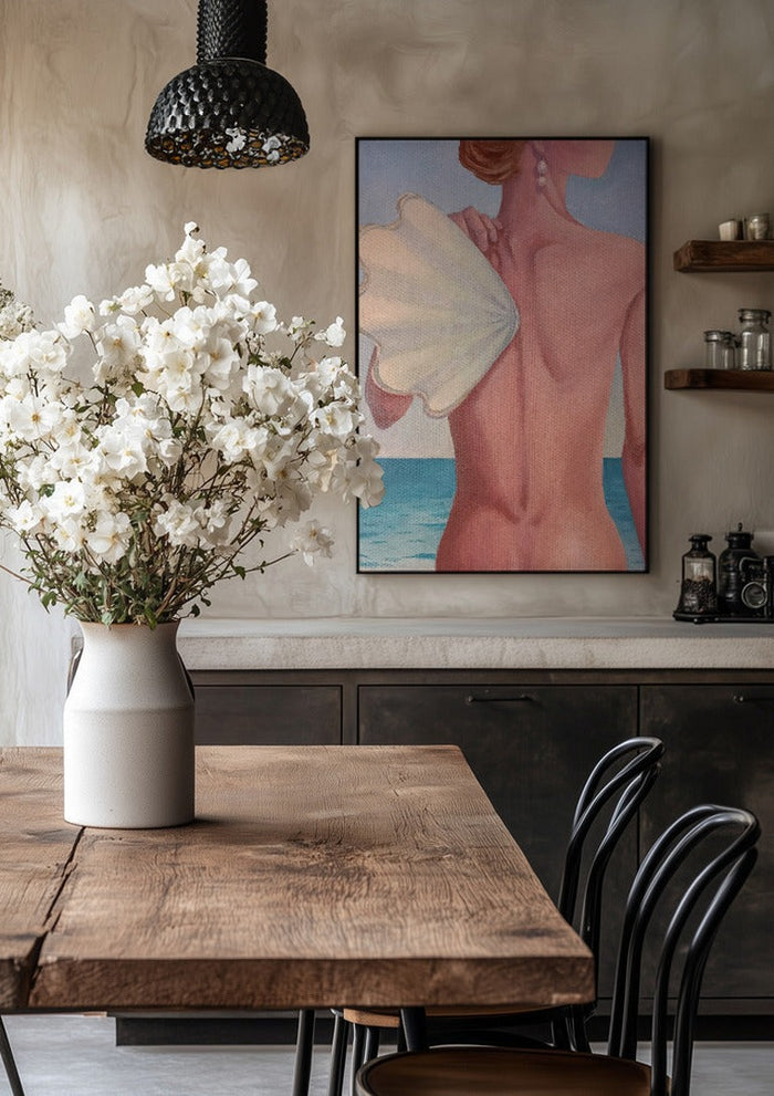 The wing by NeReid in a black frame above a rustic table with white flowers