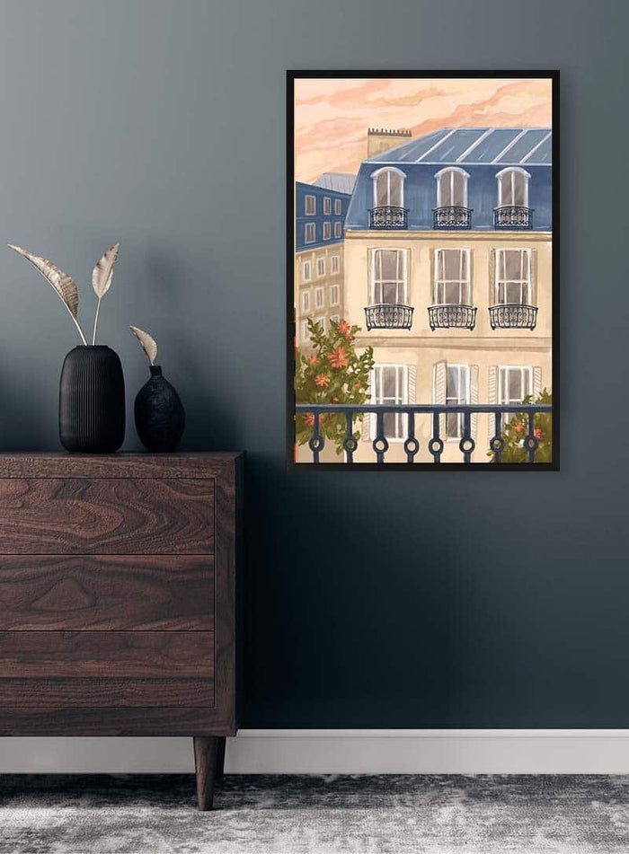 Framed "Town House - Vincent V" artwork hanging on a dark wall above a wooden dresser with vases.