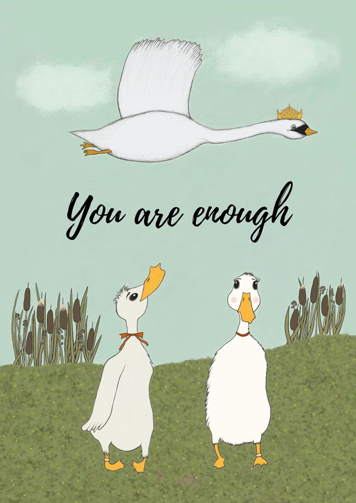 Pastel illustration of a crowned white swan flying above two ducks on a green hill, with the words You are enough.